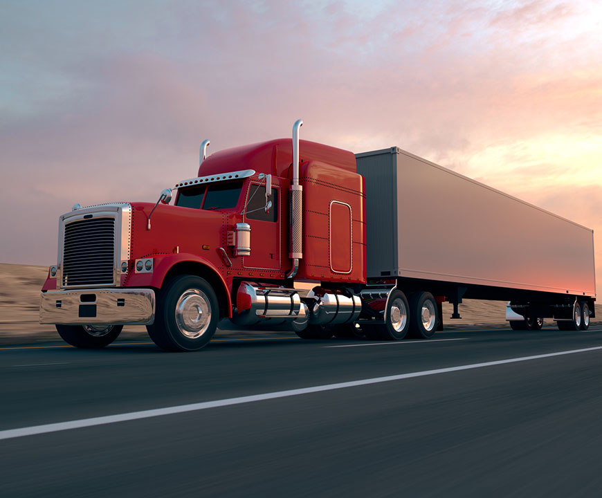 Semi truck driving on the highway, covered by Commercial trucking insurance in Beaumont, TX